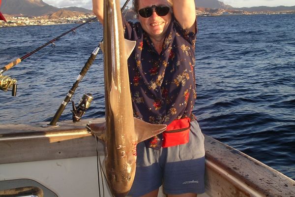 Angler with a small shark in Cape Verde