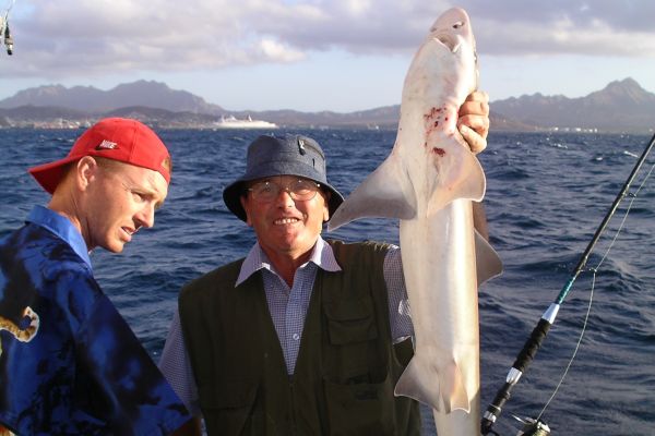 Angler with a small shark in Cape Verde
